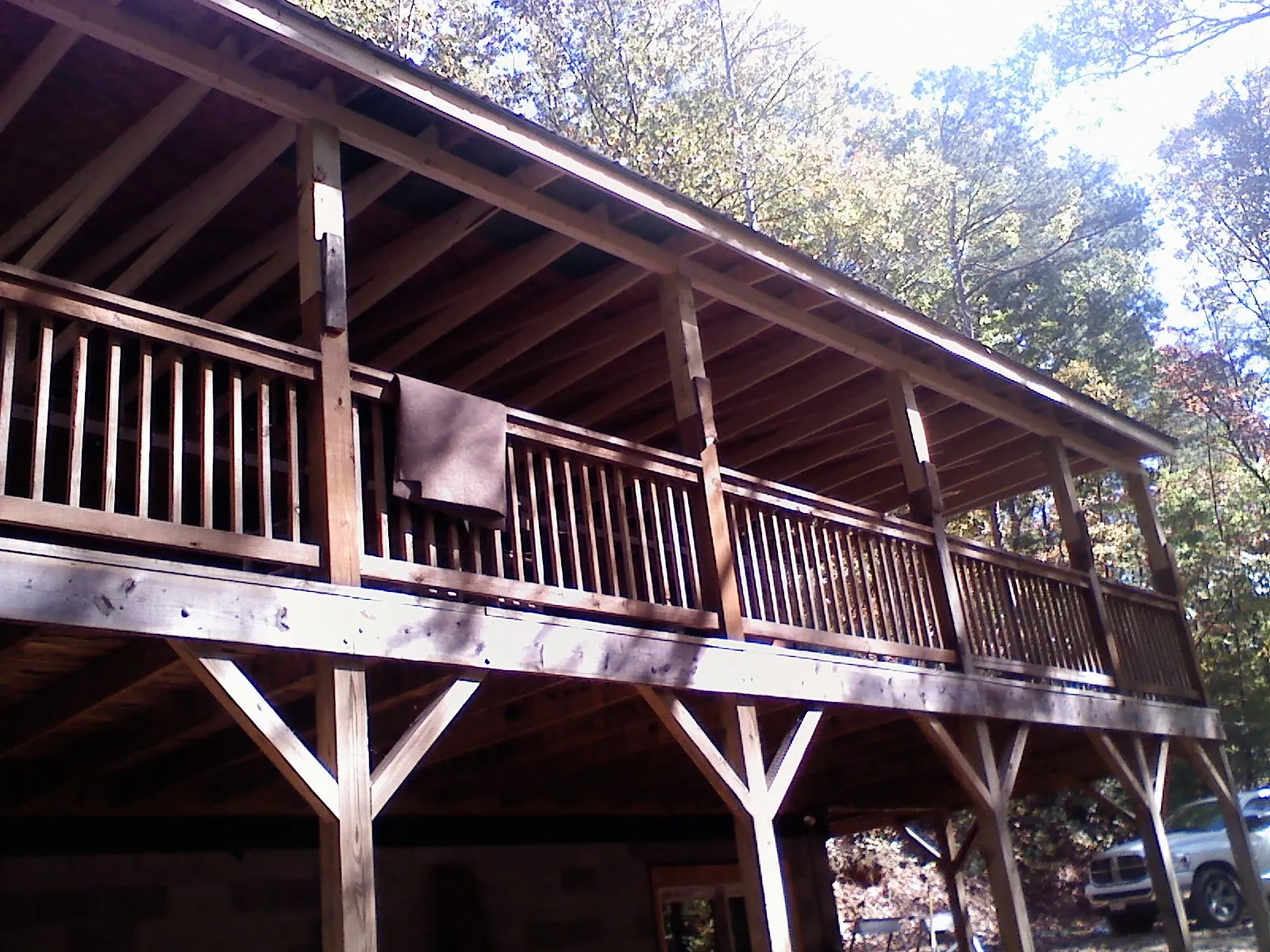 Timber framing under a new elevated porch and deck — Roof Leak Repair in Sisters by Roofing Brothers